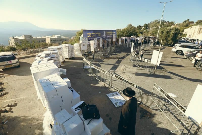 A distribution point in Tzfat seen from above, packages laid out in rows
